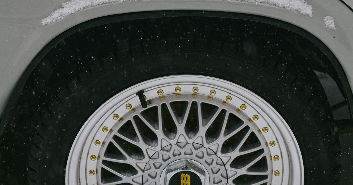 Summer, all-season and winter tyres lined up side by side showing different tread patterns