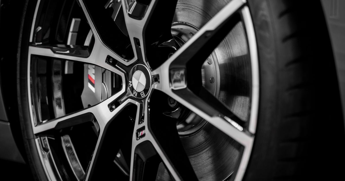 Two different brand car tyres side by side, illustrating the rules on mixing tyre brands on one car