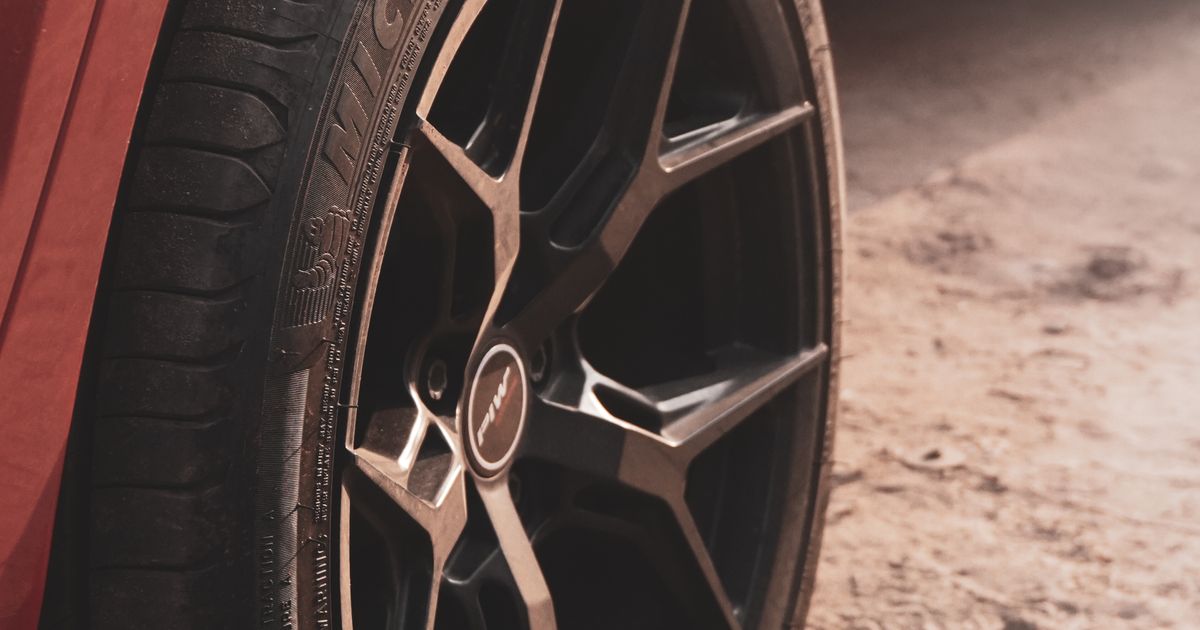 Inspecting a tyre and alloy wheel for damage after hitting a pothole