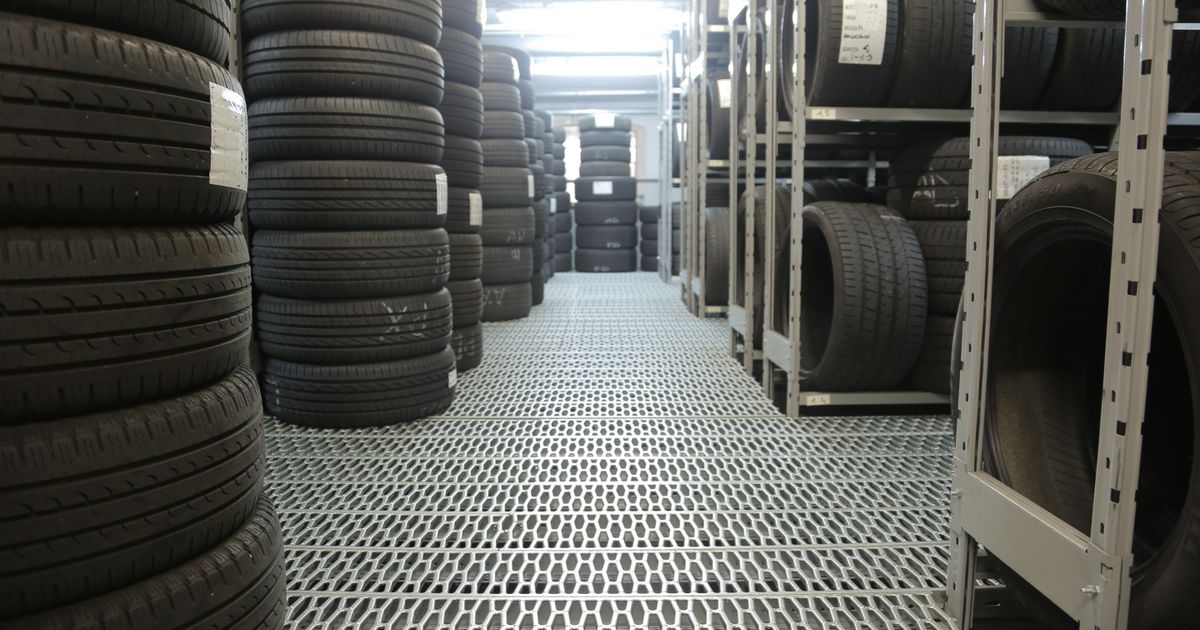 Four matching car tyres lined up, illustrating whether all four tyres should match on a UK car