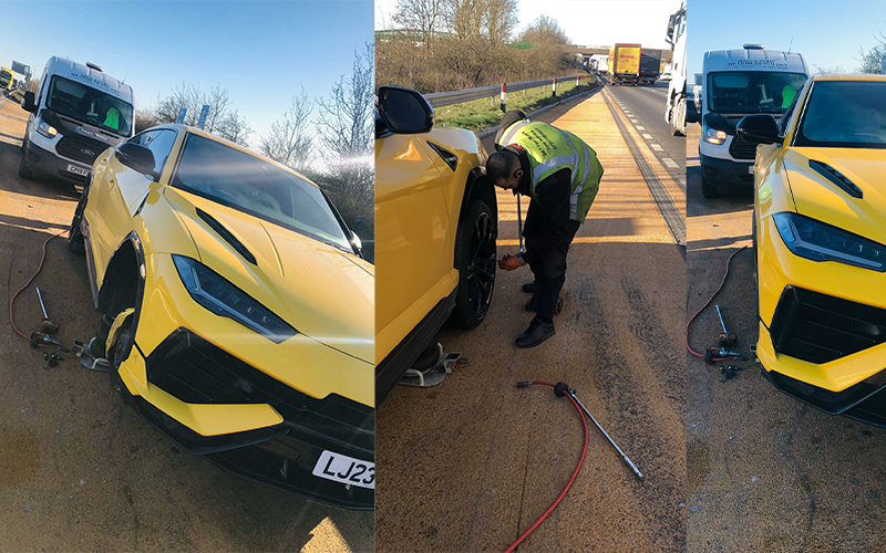Fast Tyre technician fitting a tyre