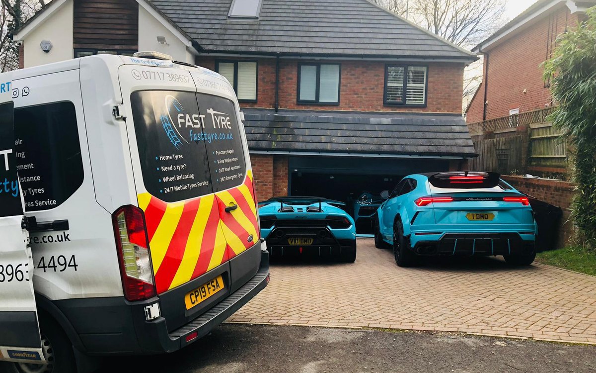 A Fast Tyre van and two turquoise Lamborghinis on a driveway